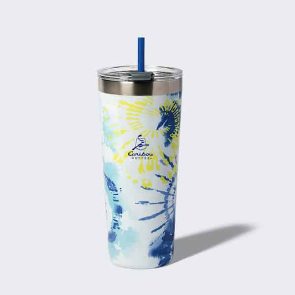 Tie Dye tumbler with a straw and a caribou coffee logo. Buy one now.