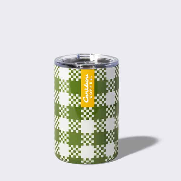 Green plaid tumbler with a yellow stripe and a caribou coffee logo. Add to cart now.