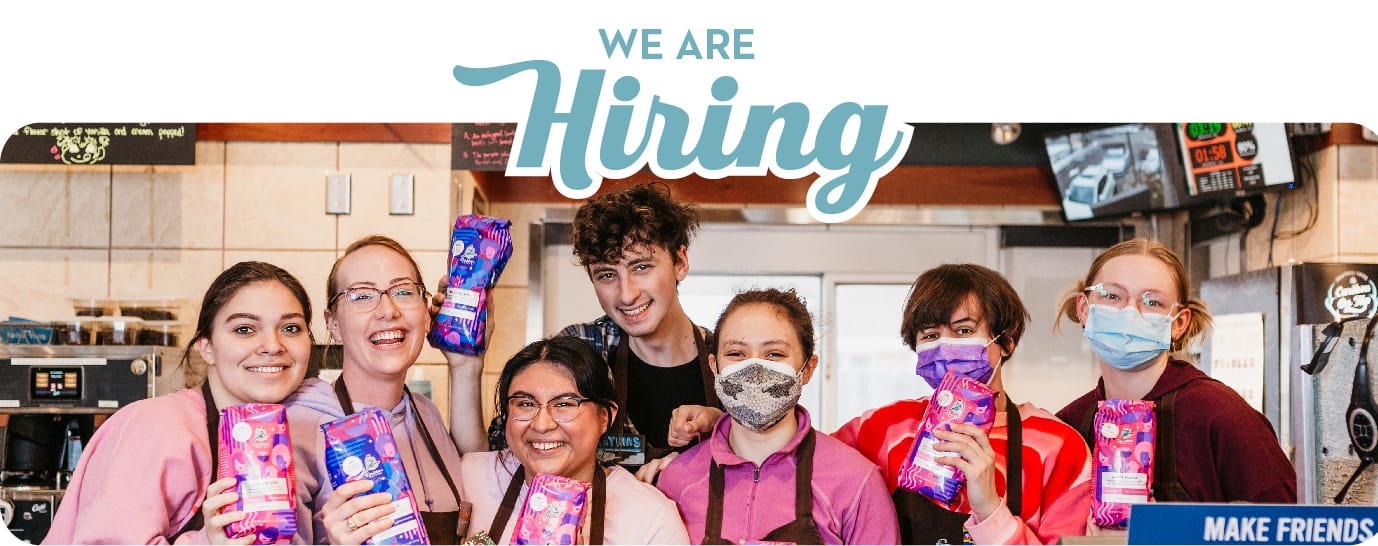 We are hiring at Caribou Coffee. Photos of team members smiling. Apply for a career now. 
