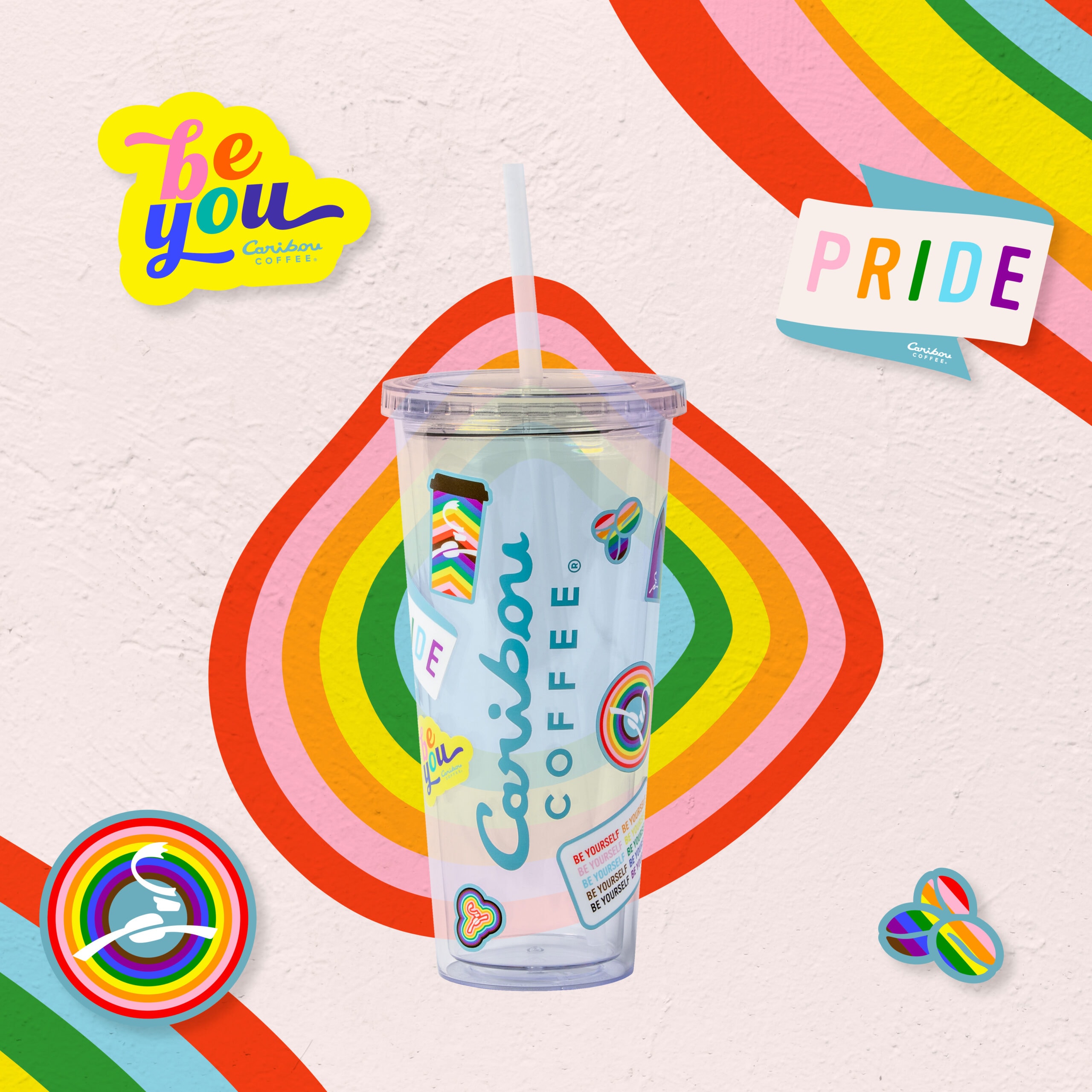 caribou coffee pride tumbler with rainbow stickers