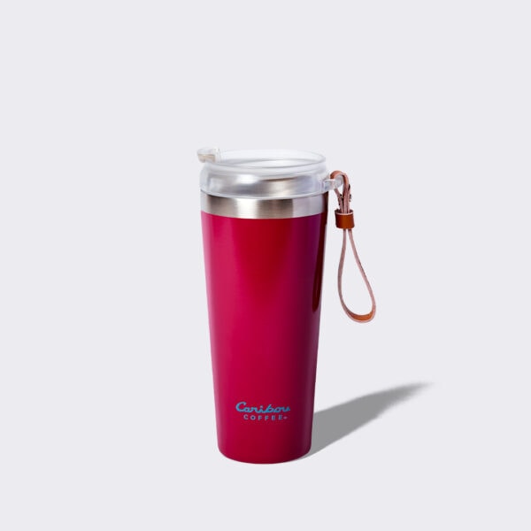 Back of Red Tumbler with a leather handle and a caribou leaping bou icon