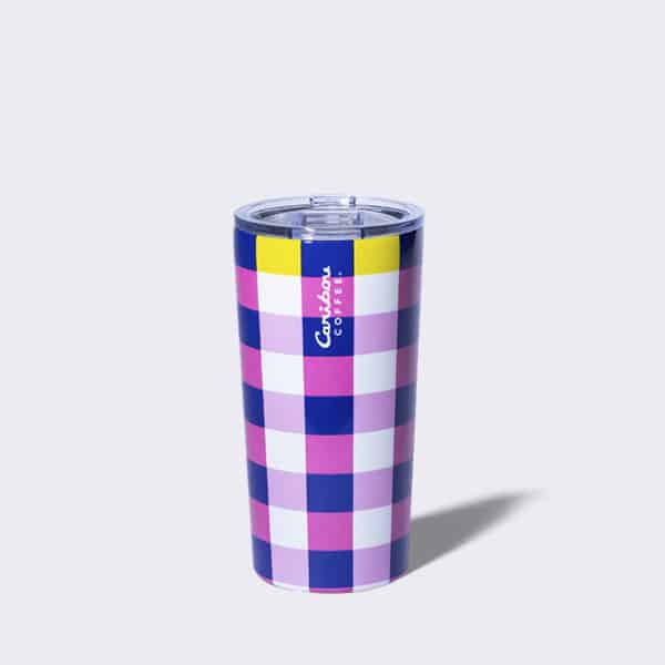 Pink plaid tumbler with closure n the top.