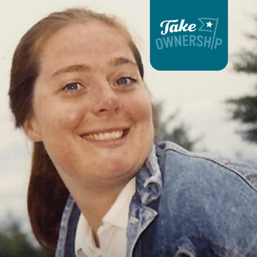 amy erickson smiling with the text "take ownership" in the corner, a caribou coffee core value