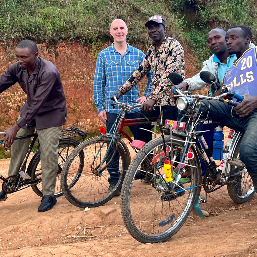 photo of farmers and brian with bicycles