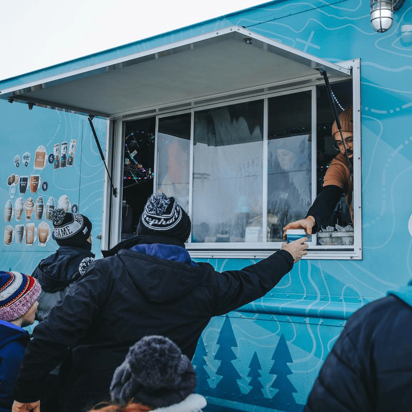 guest reaching for beverage at bou truck