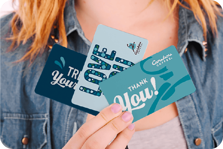 Woman holding gift cards